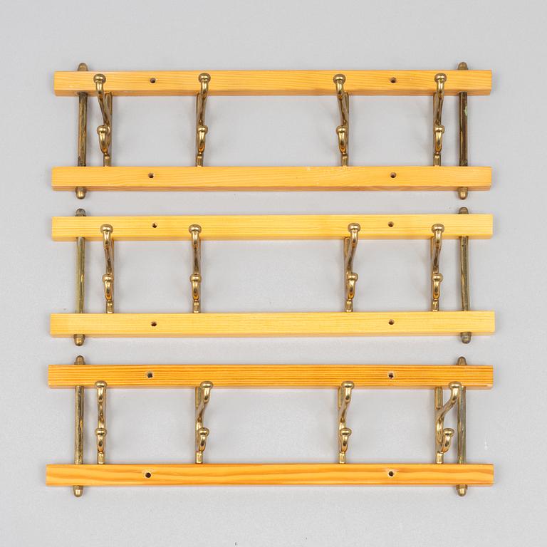 A set of three 'Dekorativ' coat hangers, Skoglunds metallgjuteri, Anderstorp, 1950s/60s.