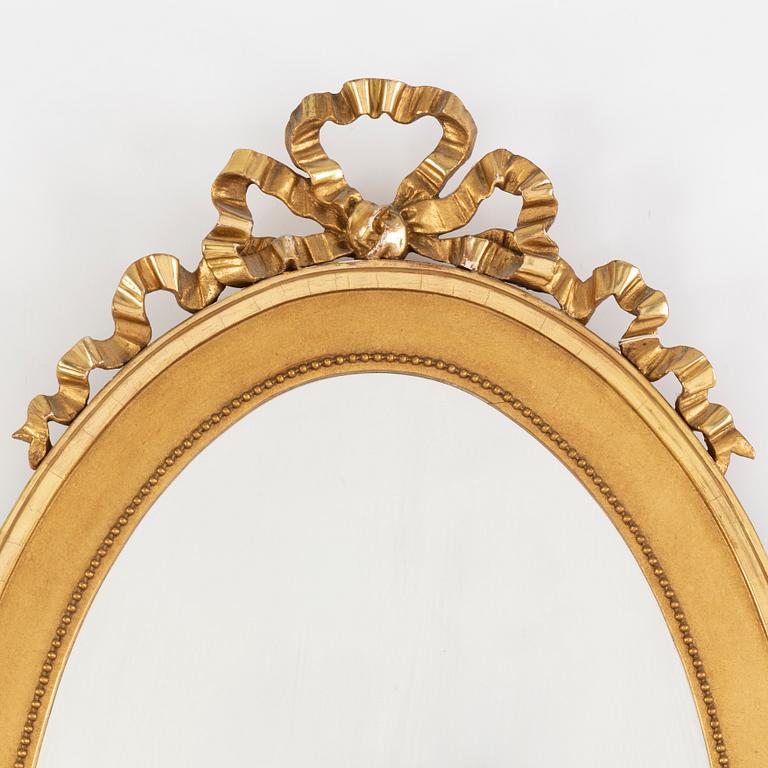 A Gustavian style mirror, mid 20th Century.