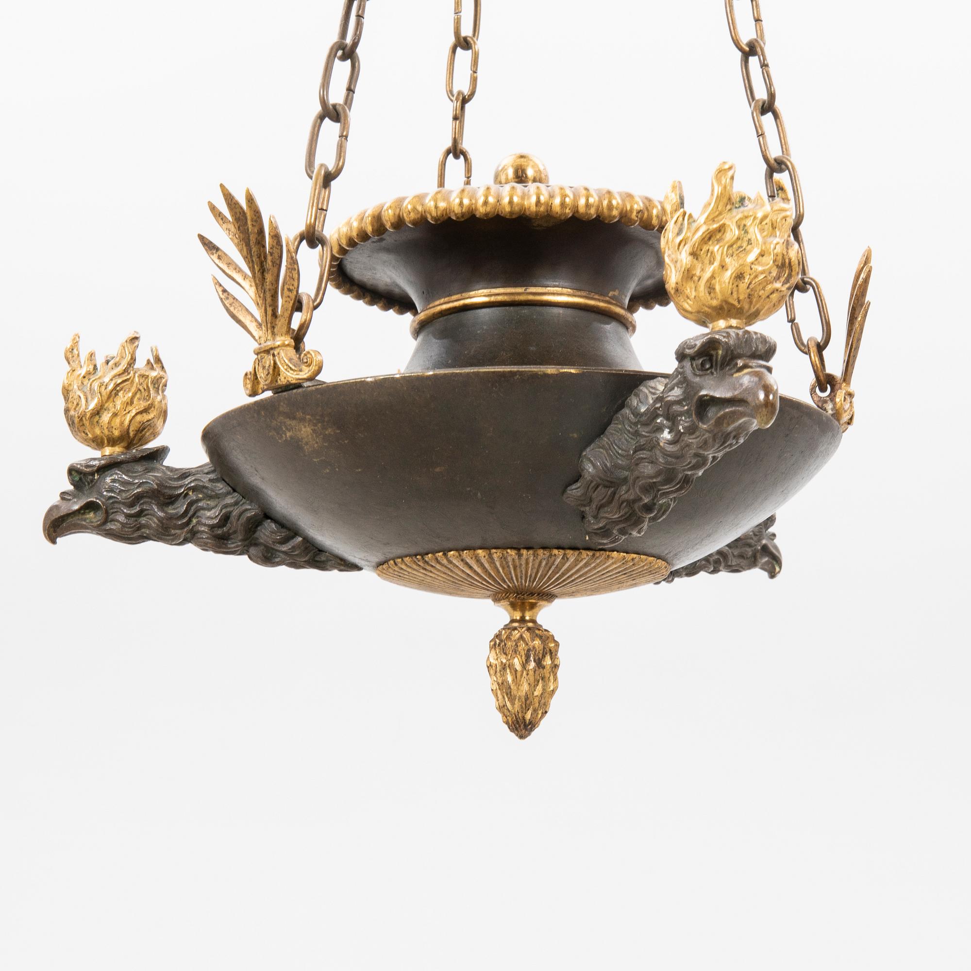 An Empire bronze chandelier.
