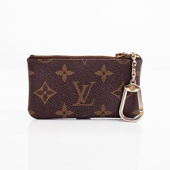 Louis Vuitton, four Monogram canvas accessories, 1987-2010.