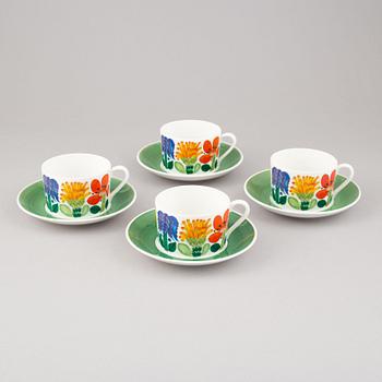 A set of four 'Tahiti' tea cups with plates by Stig Lindberg for Gustavsberg.