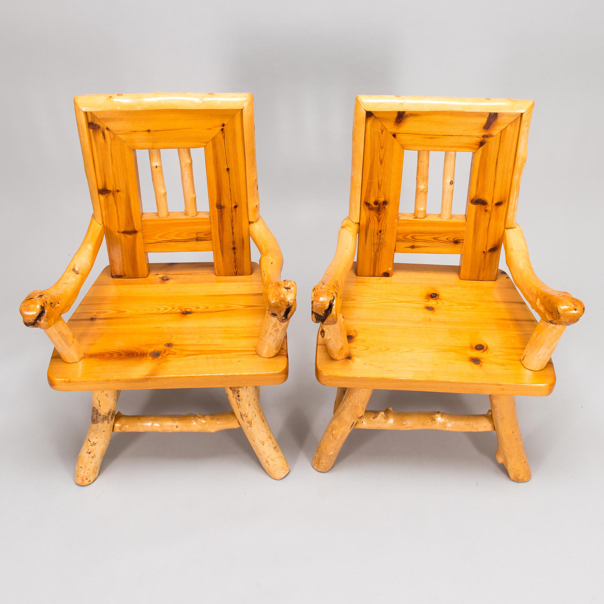 A pair of mid-20th-century armchairs made by Tauno Saarela Kuusamo Finland.