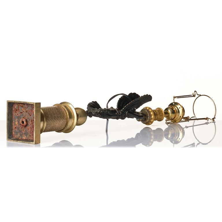 A French Empire ormolu and patinated bronze table lamp, early 19th century.