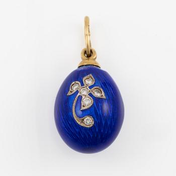 A W.A. Bolin pendant in the form of an egg, 18K gold and silver with enamel, set with round brilliant-cut diamonds.