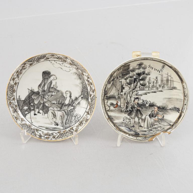 Two Chinese grisaille porcelain saucers, Qing dynasty, Qianlong (1736-95).