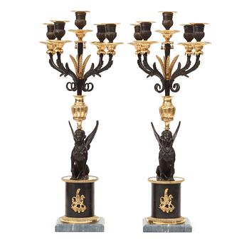 A pair of Russian Louis XVI-style 19th century five-light candelabra.