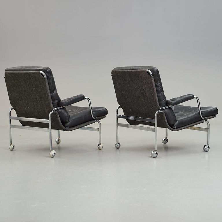 Bruno Mathsson, a pair of "Karin" easy chairs, DUX, Sweden, post 1969.