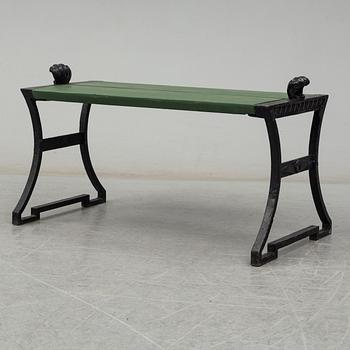 FOLKE BENSOW, a 'Snecan' cast iron carden bench from Byarums Bruk, sesigned in 1923.