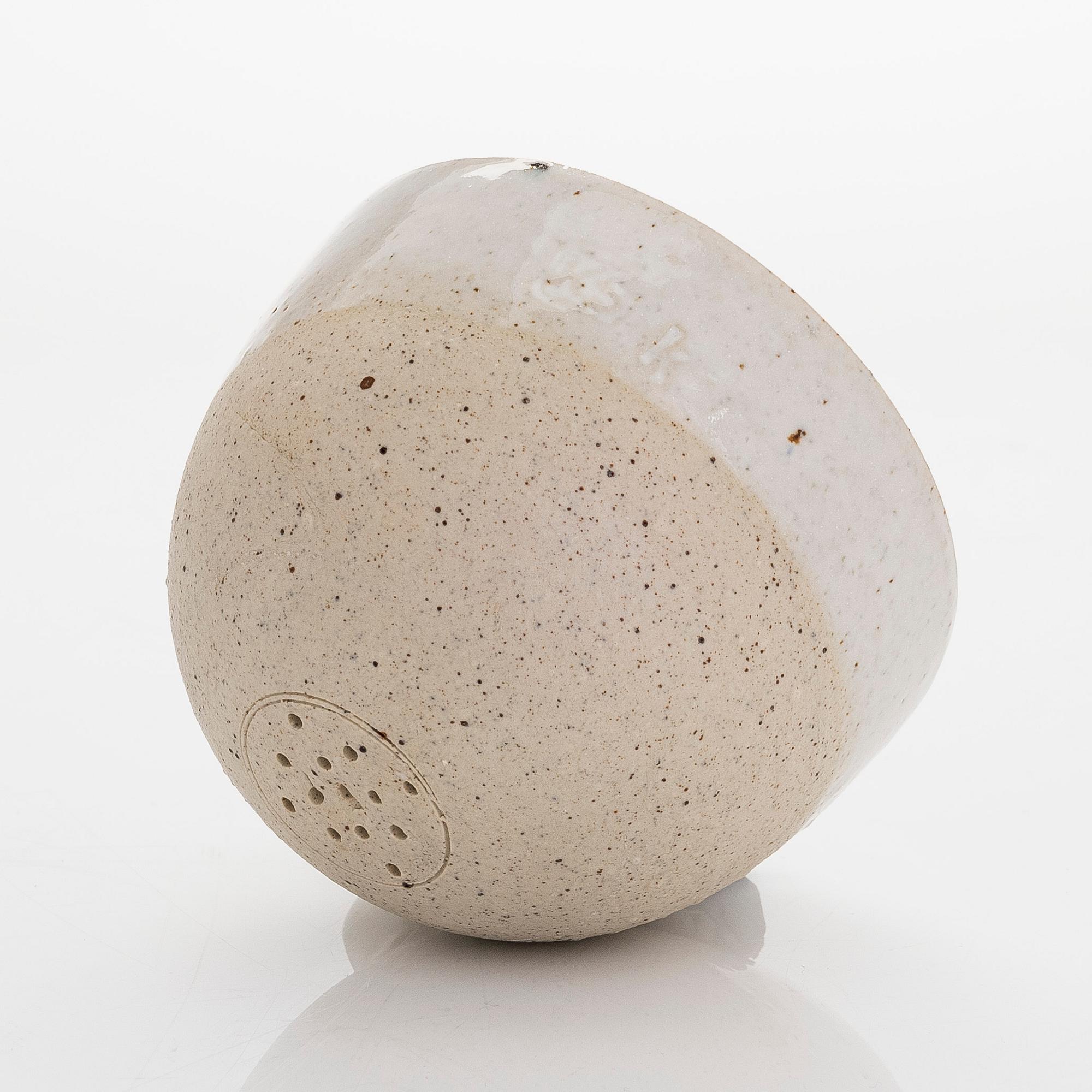 Kyllikki Salmenhaara, a stoneware tea strainer signed KS.