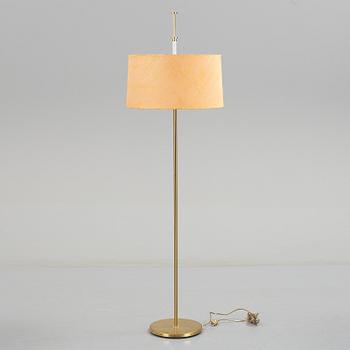 A 1960s brass floor light.