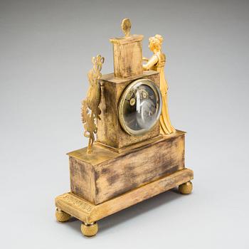 A French Empire early 19th century gilt bronze mantel clock.