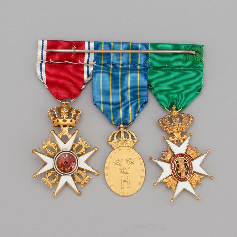 Three medals one of the Sankt Olov order, one of the Vasa order and one from the Swedish army.