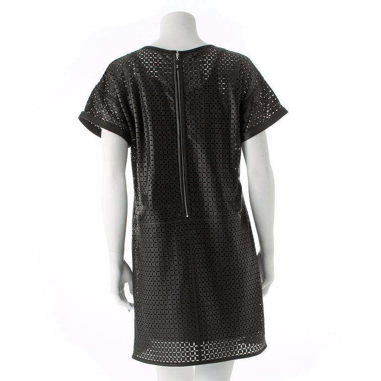 ESCADA SPORT, a black openwork leather dress.