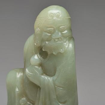 A finely carved nephrite sculpture of an immortal, Qing dynasty, probably Qianlong (1736-95).