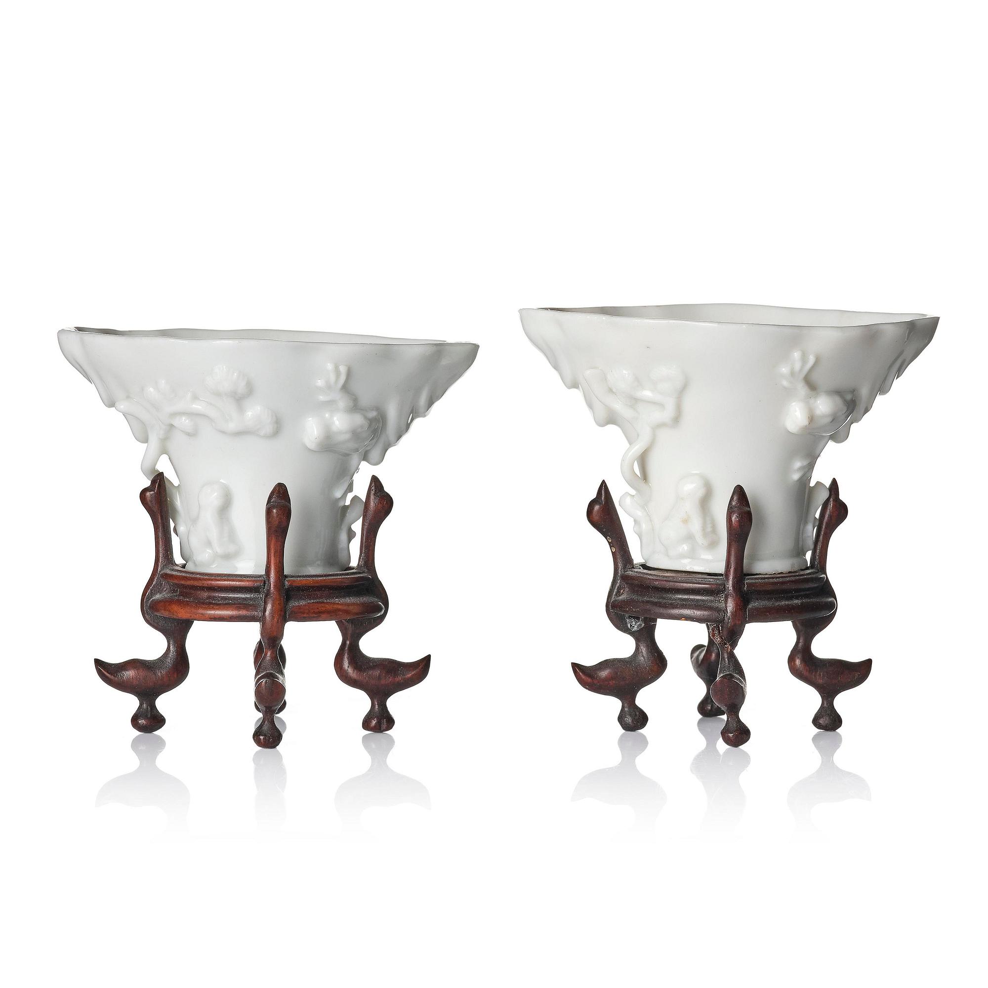 Two blanc de chine rhinoceros libation cups, Qing dynasty, Kangxi (1662-1722).