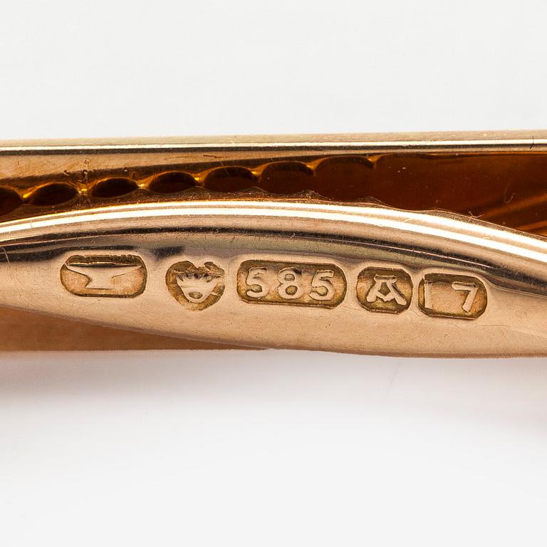 Elis Kauppi, A 14K gold tie pin with hematites. Kupittaan Kulta Turku 1962.