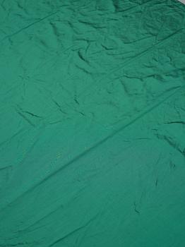 CURTAINS, 4 pcs., emerald green silk, ca 304 x 129 cm each, Svenskt Tenn, the second half of the 20th century.