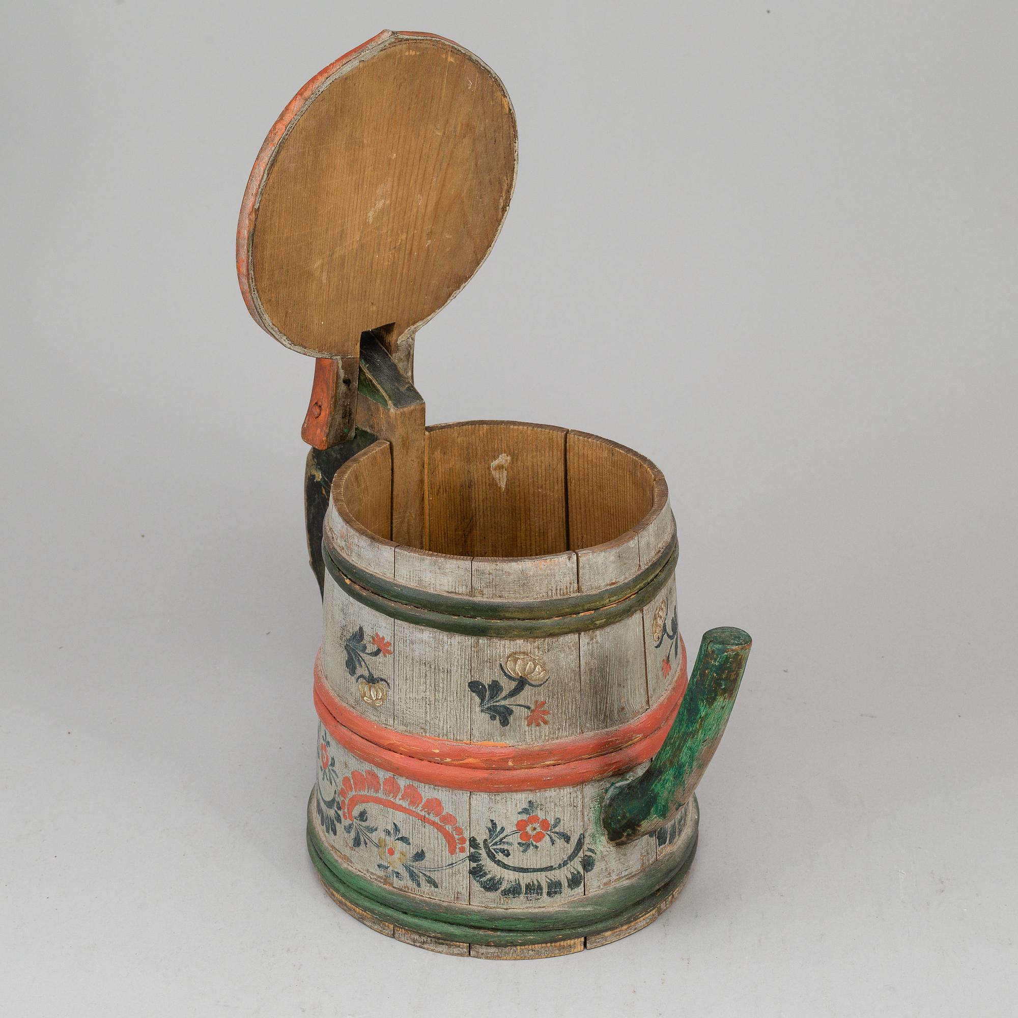 A painted wooden jar from the 19th century.