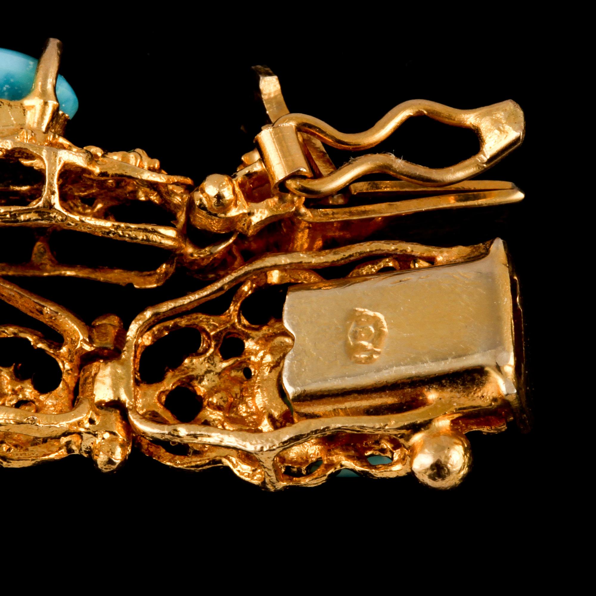 ARMLÄNK, 18k guld med 11 cabochonslipade turkoser, utländska stämplar. Vikt 20 g.