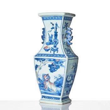 An iron red and underglaze blue vase, Qing dynasty, 18th Century.