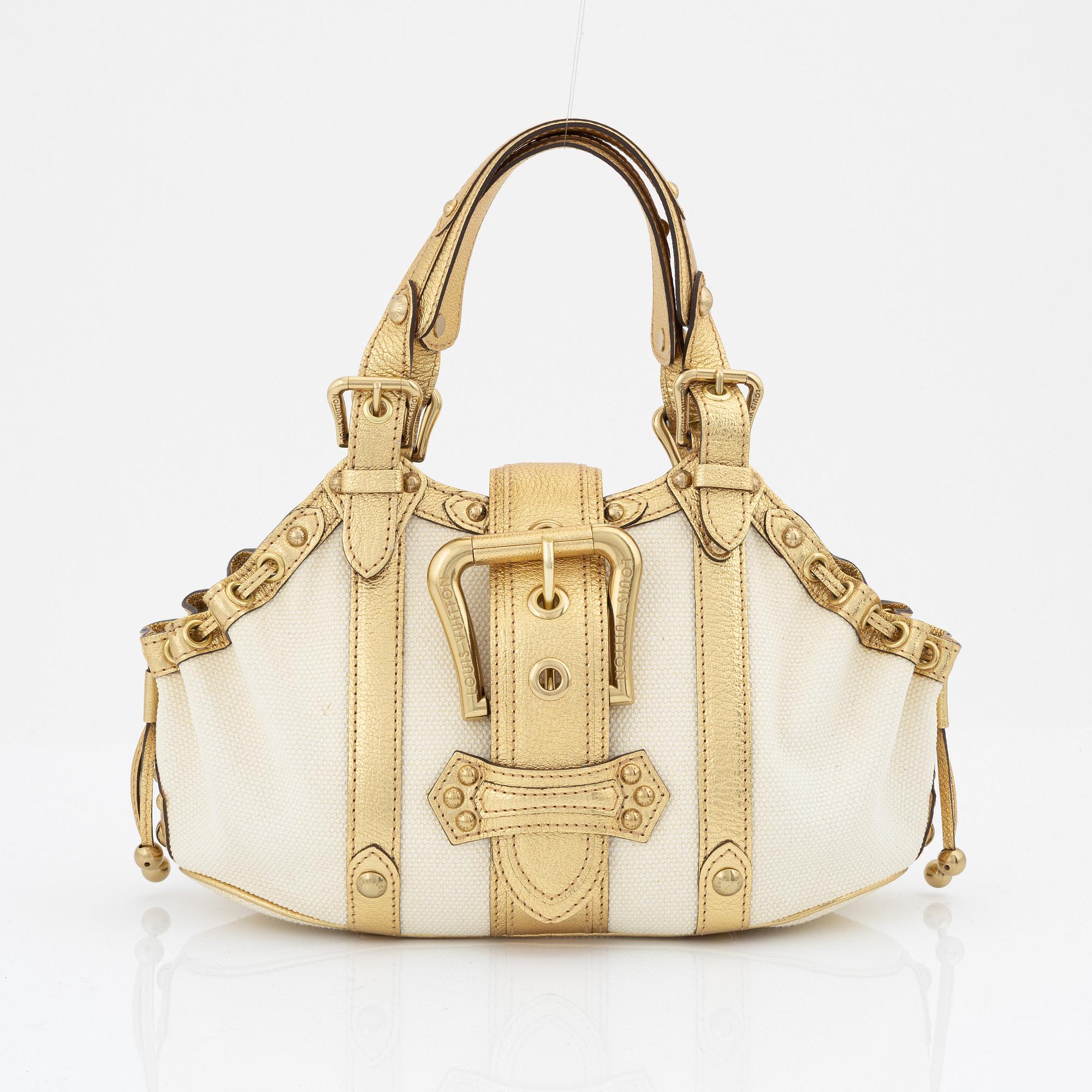 Louis Vuitton, a white canvas and gold 'Theda PM' bag, 2004.