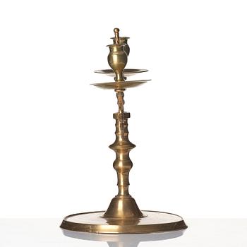 A baroque brass two-branch candelabra, Northern Europe/Sweden, 17th century.