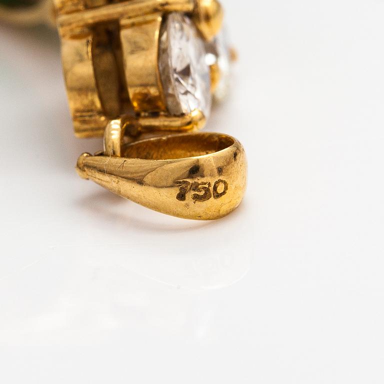 An 18K gold pendant with an emerald and diamonds ca. 2.00 ct in total. AIG certificate.