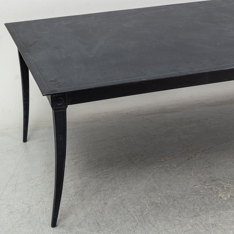 A metal Restoration Hardwood table, 21st Century.