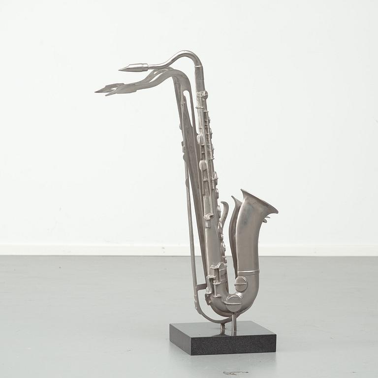 FERNANDEZ ARMAN, Sculpture in nickel plated bronze signed Arman and numbered 19/100.