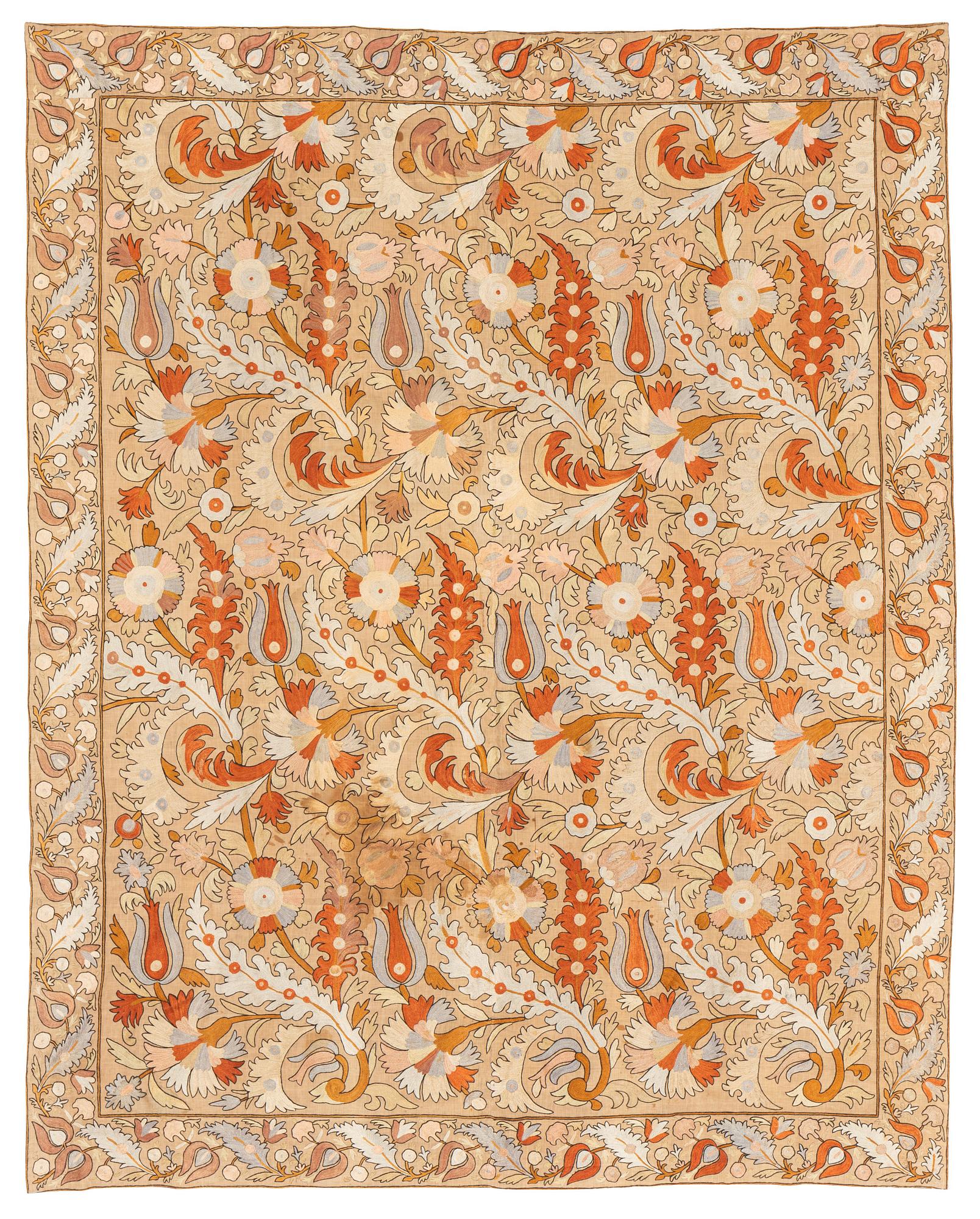 An embroidery, likely an antique Uzbekistan suzani, ca 226.5-230.5 x 180-182 cm.