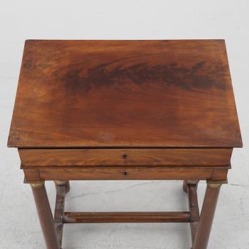 A French Empire mahogany sewing table, first part 19th century.
