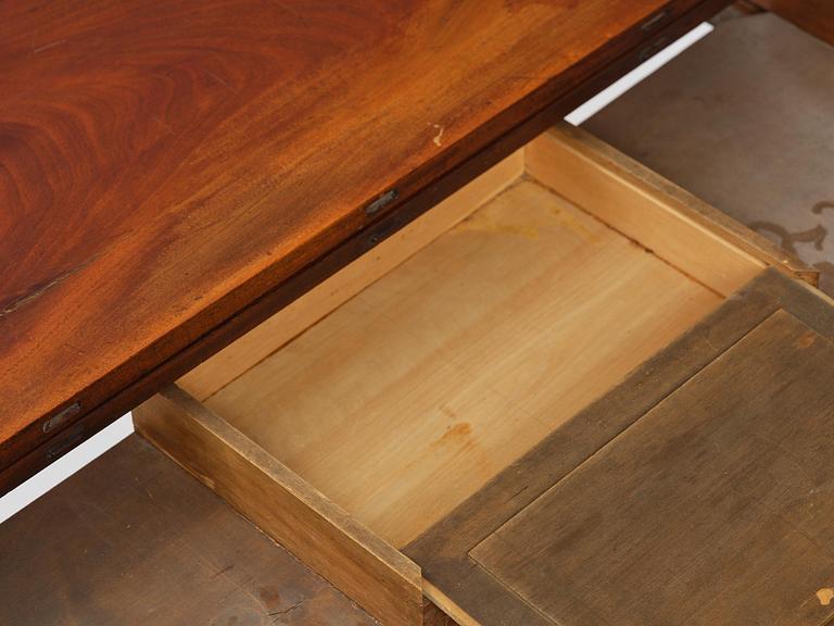 A Gustavian 'concertina action' mahogany games table by Georg Haupt (master in Stockholm 1770-84).