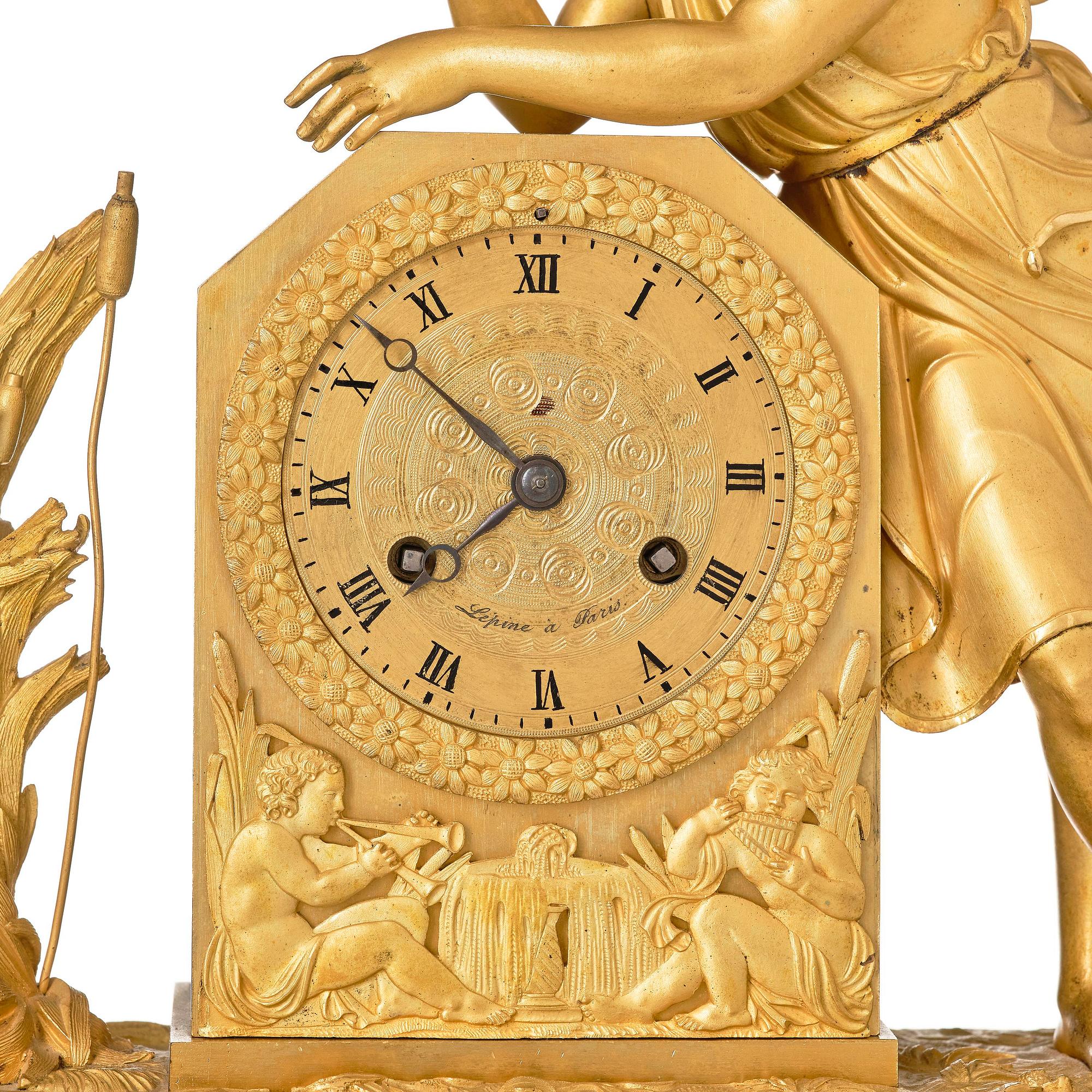 A French Empire ormolu and patinated bronze mantel clock, Paris, early 19th century.
