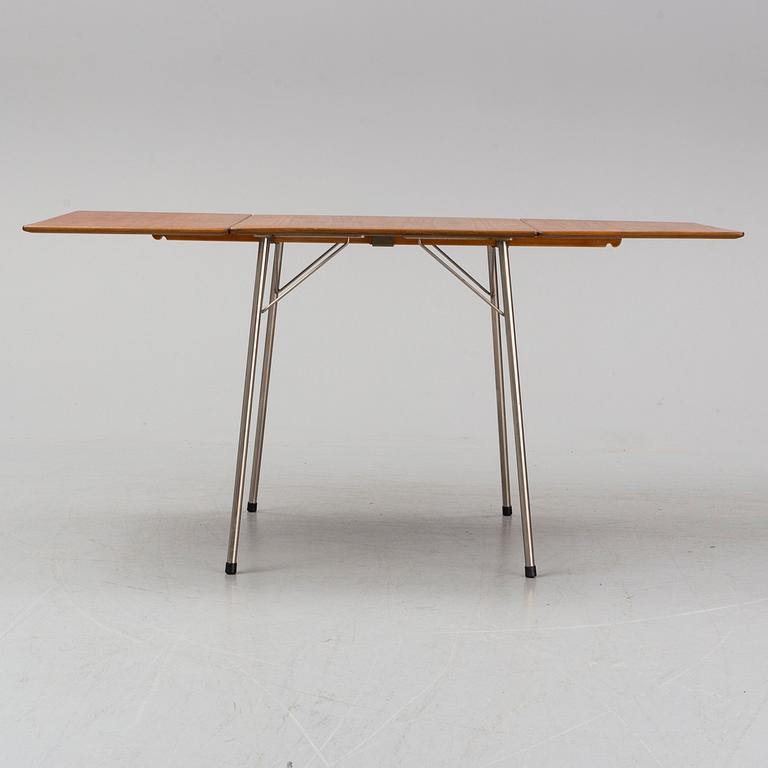 A table by Arne Jacobse, Fritz Hansen, Denmark. Designed 1952-1953.