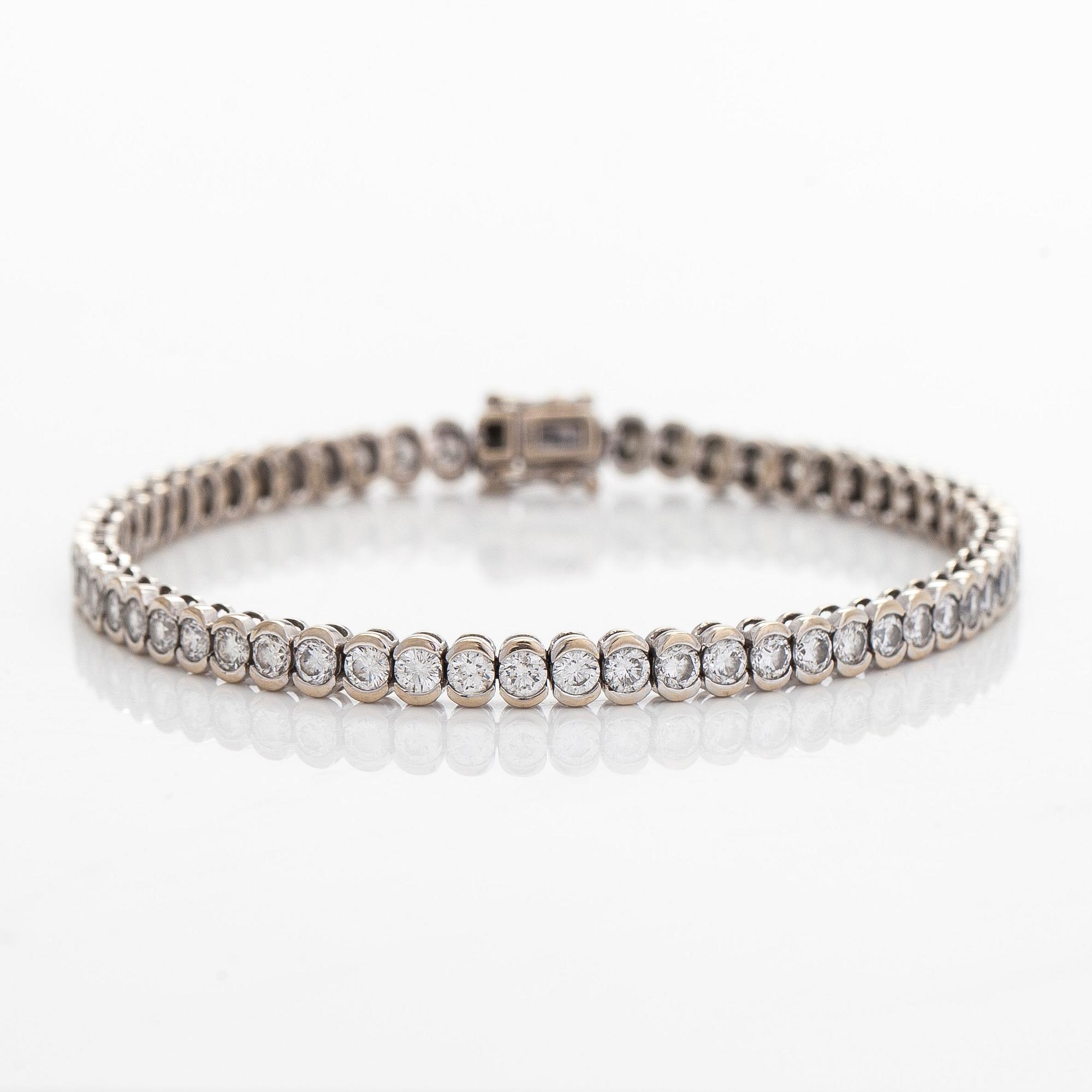 Tennisrannekoru, 18K valkokultaa, briljanttihiottuja timantteja.