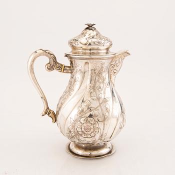 A 20th century Neo Rococo silver coffee pot (no hallmarks), weight 823 grams.