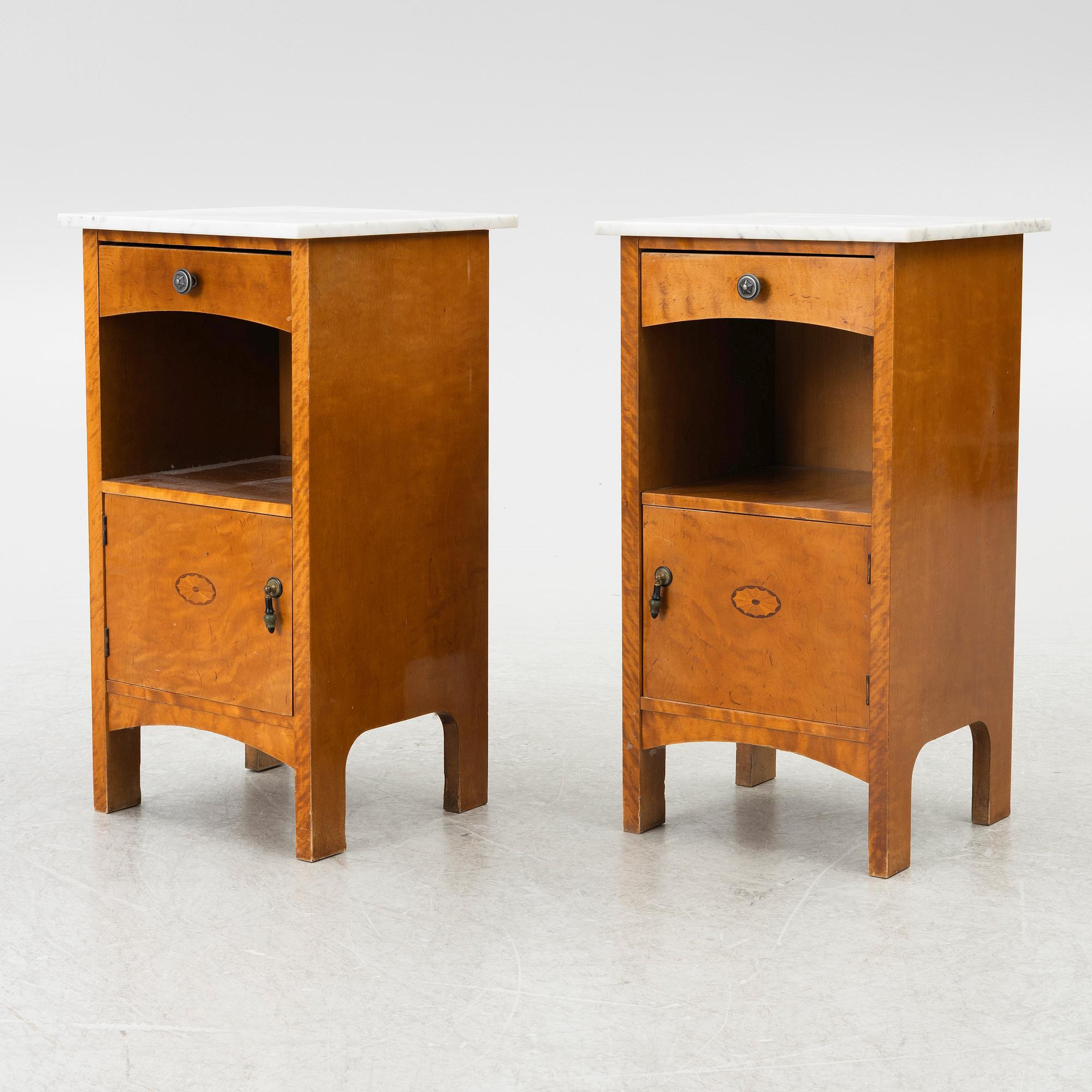 A pair of early 20th century bedside tables.