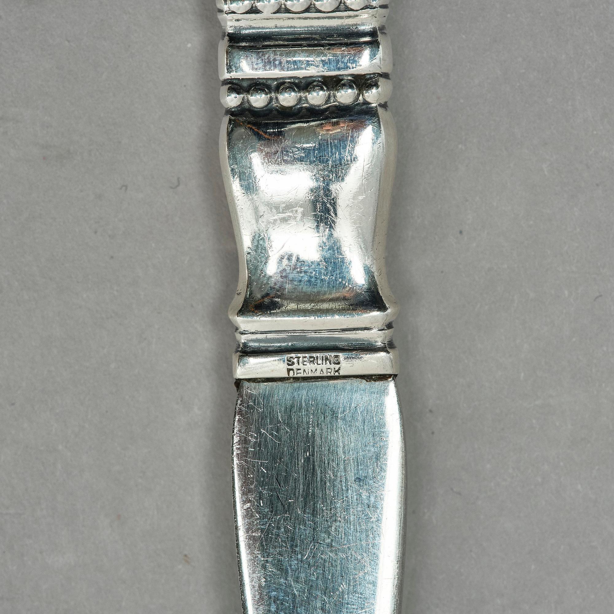 Georg Jensen, a pair of sterling silver sallad-cutlery, design Johan Rohde, Copenhagen after 1945.