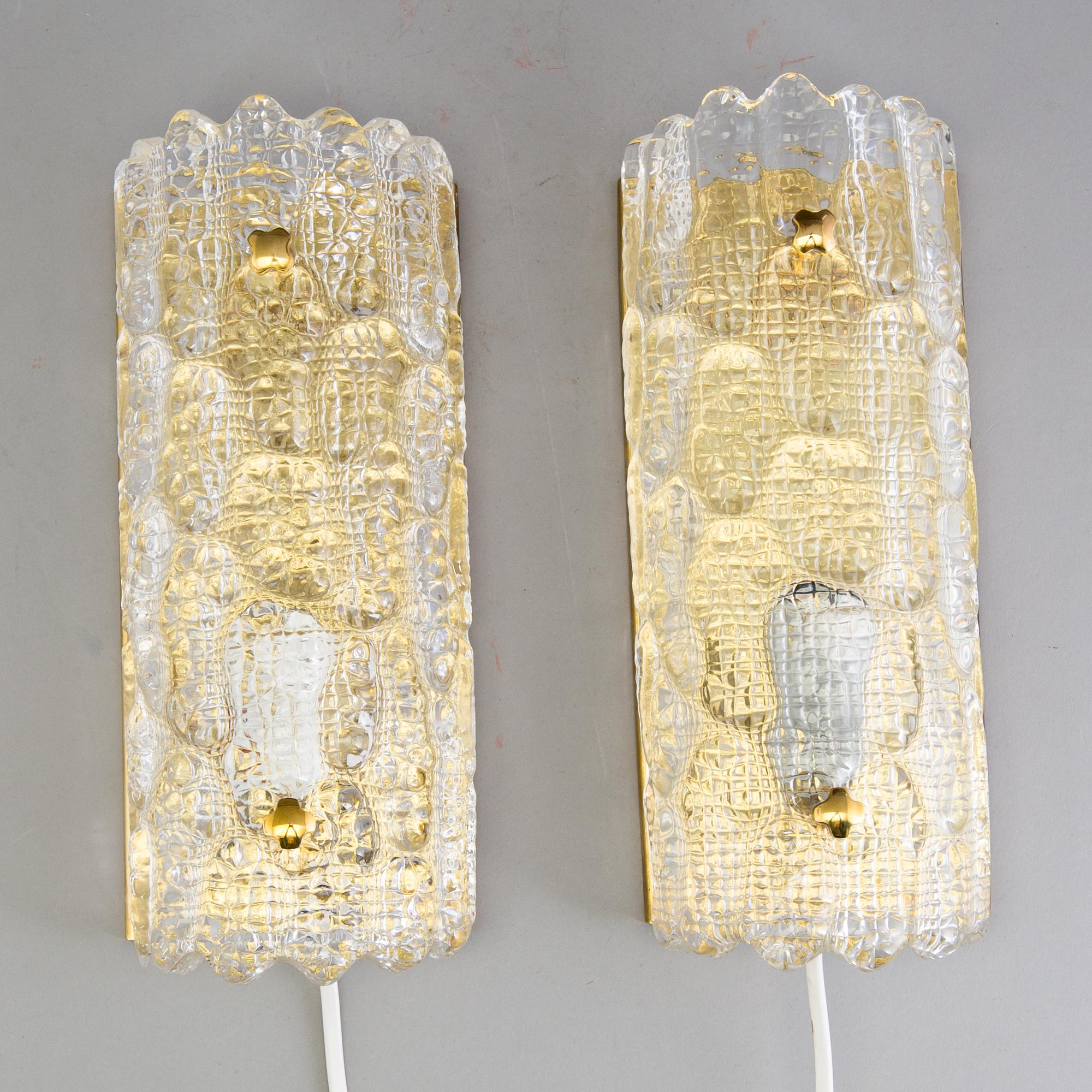 A pair of wall lamps by Carl Fagerlund, 20th century.