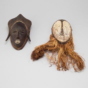 Two 20th century African wooden masks.