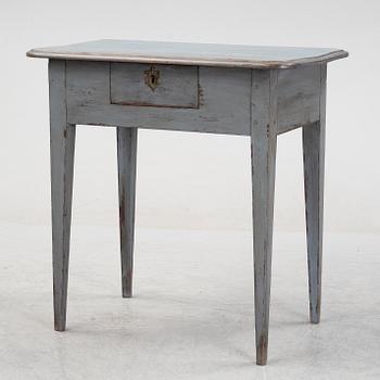 A painted table with a drawer, 19th Century.