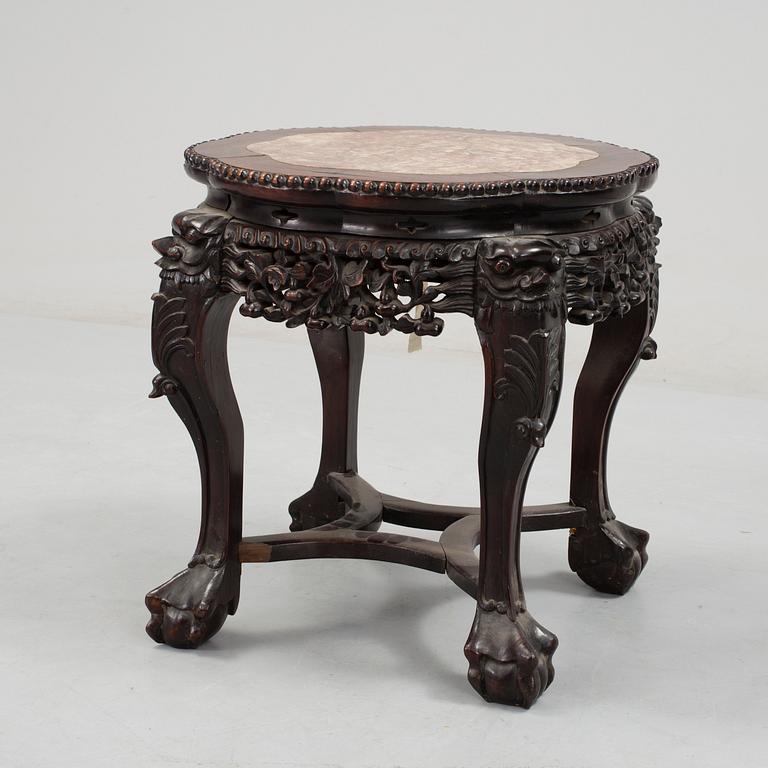 A Chinese hardwood table with marble top, 20th Century.