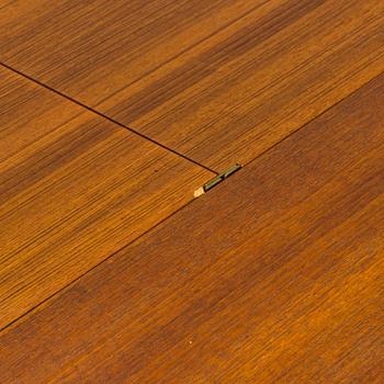 A mid-20th century dining table.