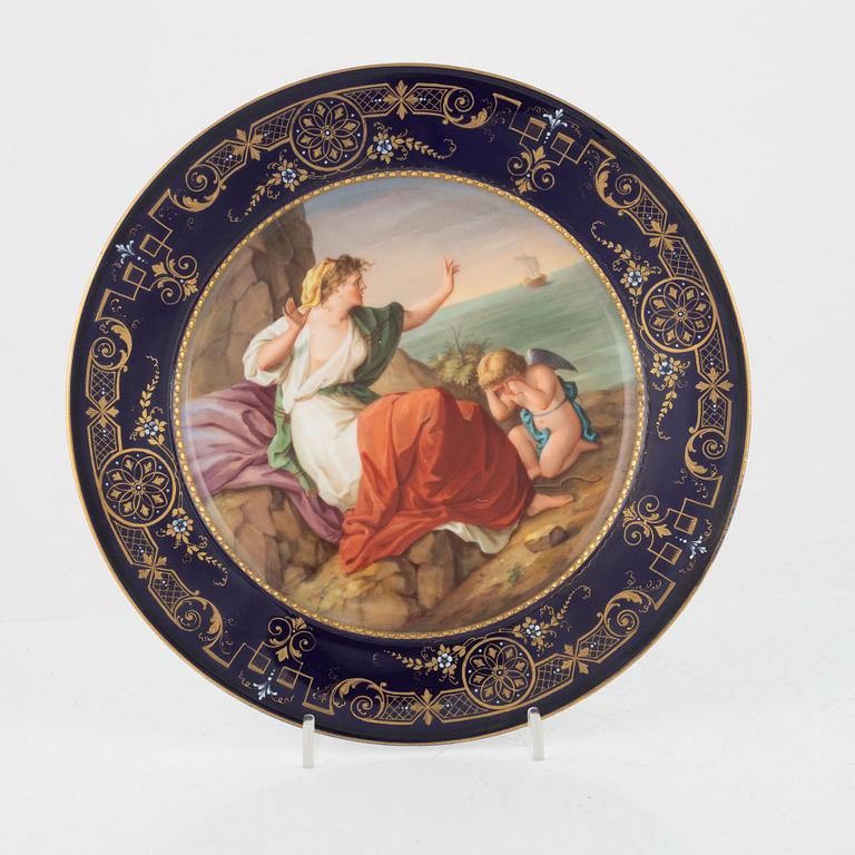 A gilded and painted plate, around 1900.