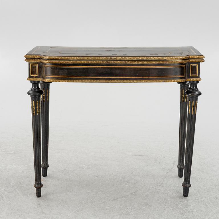 A Louis XVI style games table, circa 1900.
