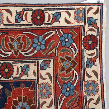 A RUG, a semi-antique Persian with a Veramin pattern, ca 199,5 x 150,5-153 cm.