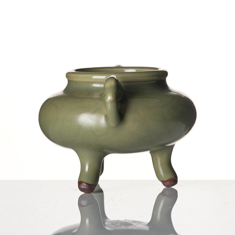 A celadon tripod brush-washer/censer, late Ming dynasty.