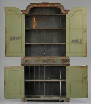 A Swedish polychrome-painted rococo cabinet, late 18th century.