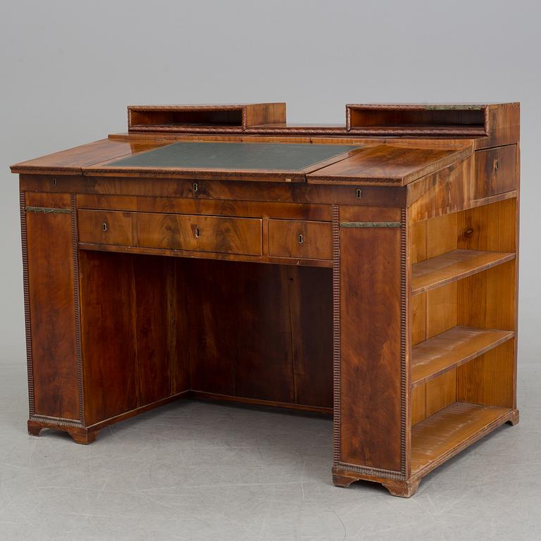 A mid 19th century writing desk and chair.