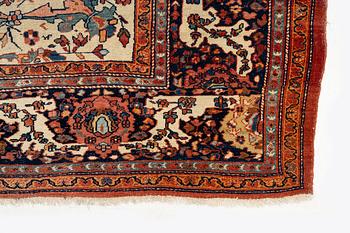 An Antique Sarouk carpet, West Persia, c. 353 x 260 cm.